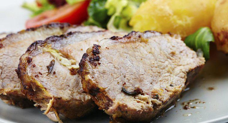 Come cucinate il maiale arrosto su un barbecue?
